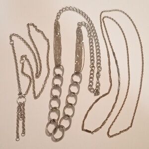 #1102.  3 Piece Assorted Silver Toned Necklace Bundle